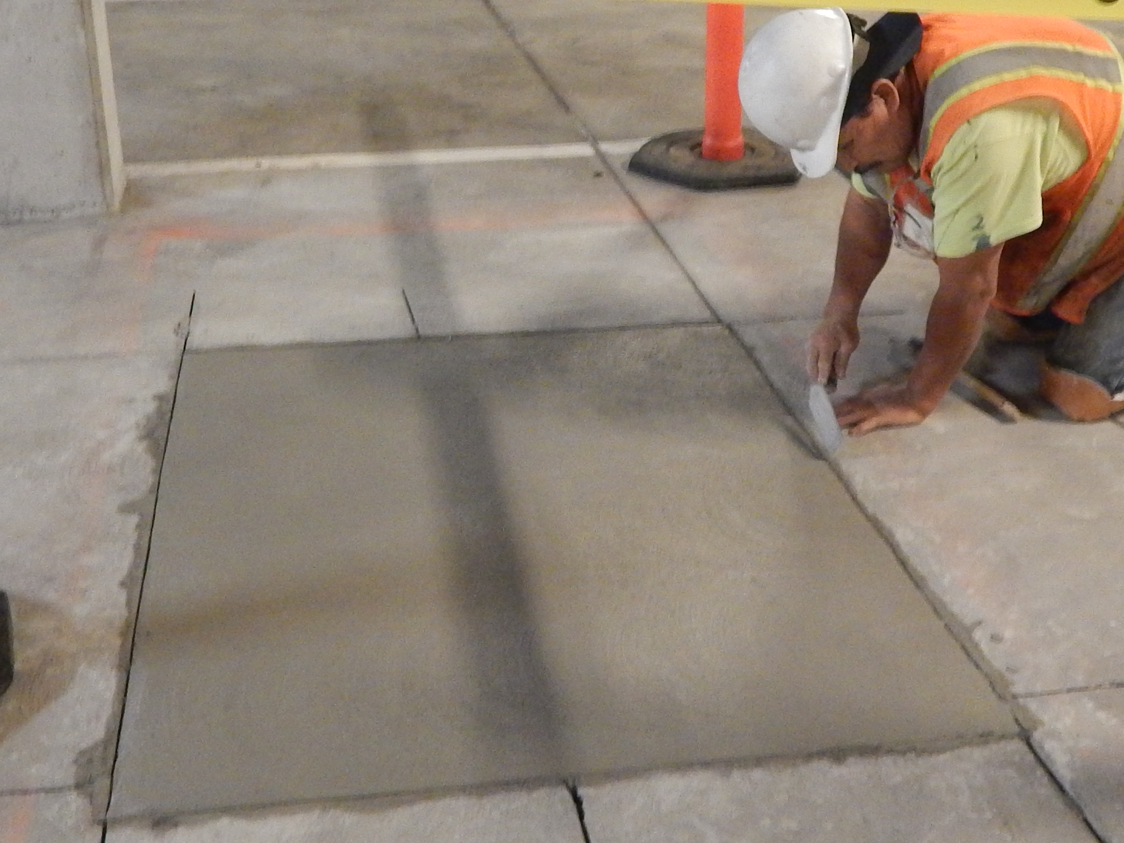 Hand finishing the concrete